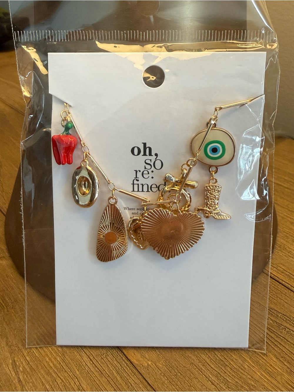 Oh So Refined Gold Charm Bracelet with Western Boho Theme